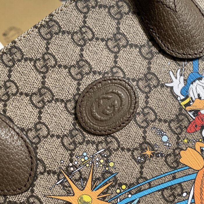 구찌 레플리카  디즈니 도널드덕 프린팅 토트백 13